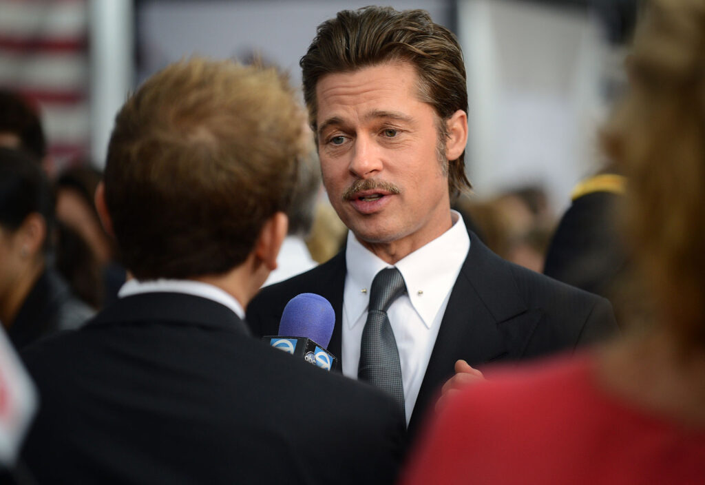 Brad Pitt gives interview on Red Carpet at premiere of Fury at Newseum in Washington D.C.