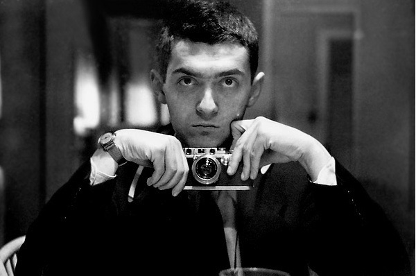 Black and white picture of Stanley Kubrick holding a camera
